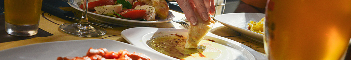Eating Mediterranean Cafe Salad at Zeytoon Café restaurant in Laguna Beach, CA.